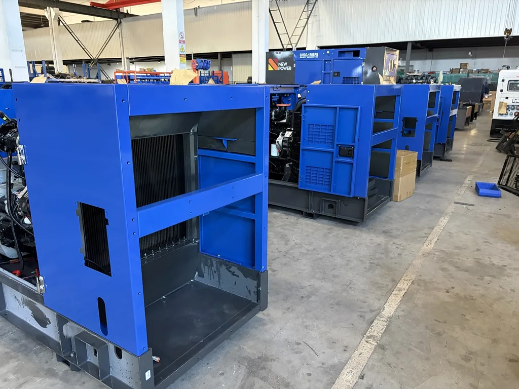 Blue generator enclosures being assembled