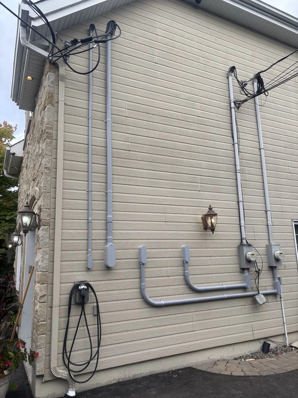 Electrical conduits installed on a building wall